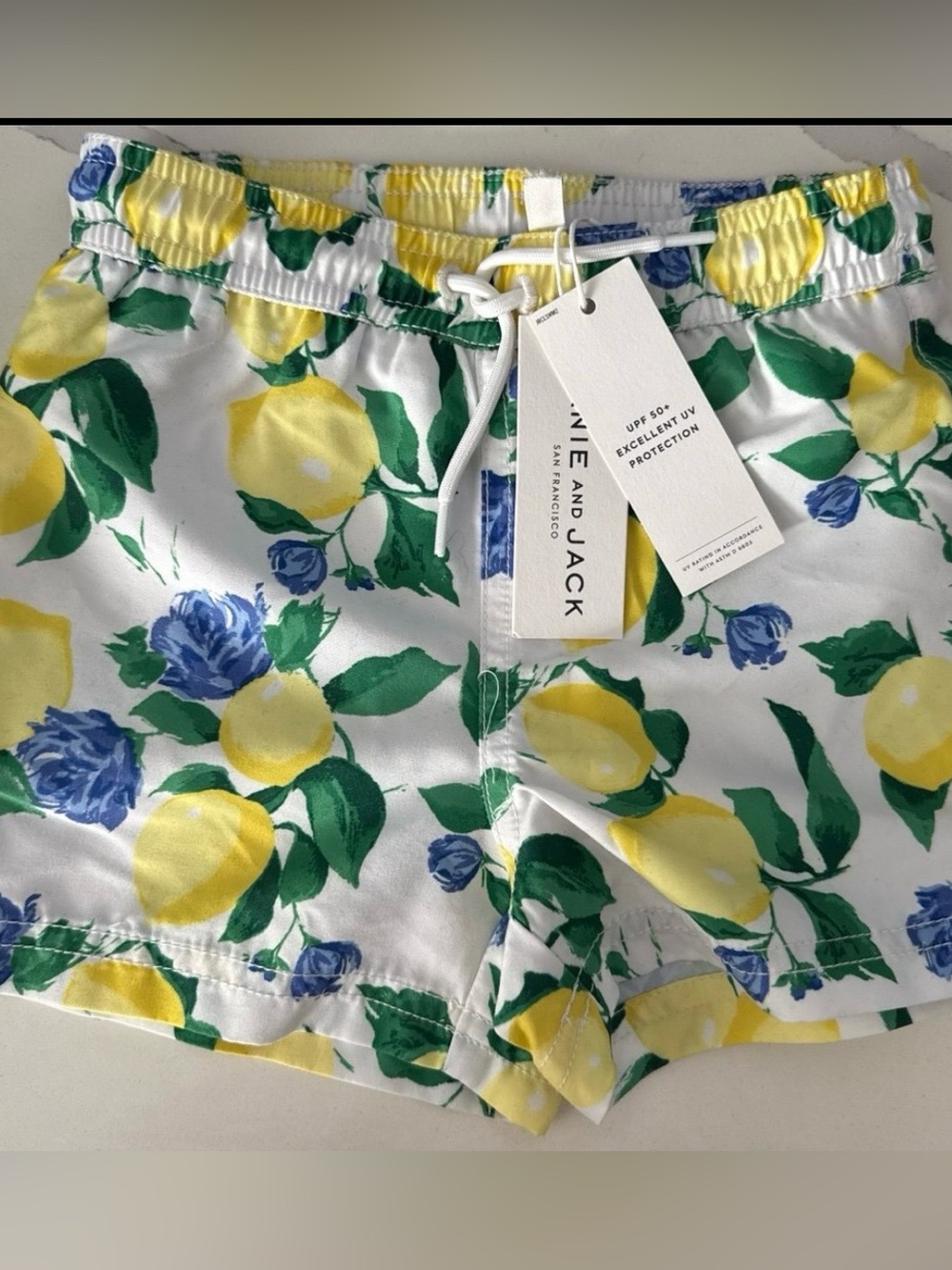 Janie and Jack Lemon & Blue Floral Swim Trunks